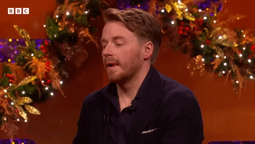 Man With Eyes Closed and BBC Logo