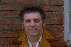 Man With Eyes Closed And Fan Blowing GIF