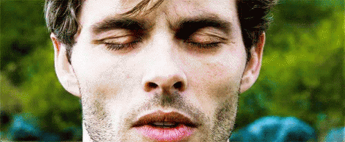 Man with Eyes Closed and Mouth Open