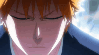 Man With Eyes Closed and Orange Hair