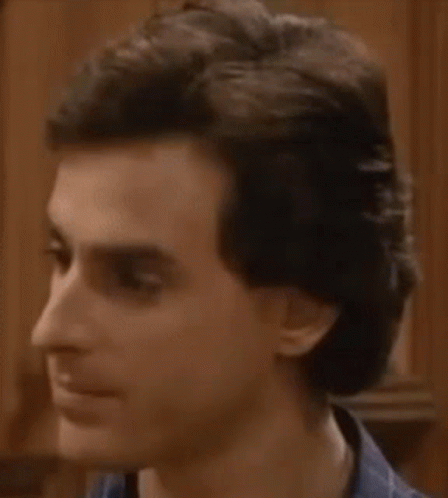 Man With Eyes Closed And Ponytail GIF