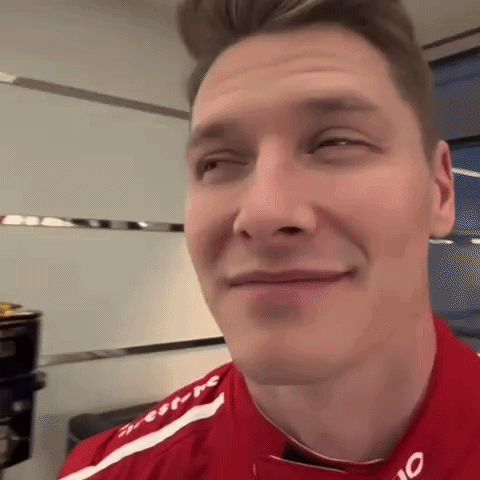 Man with Eyes Closed and Red Shirt