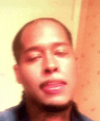 Man with Eyes Closed and Tongue Out