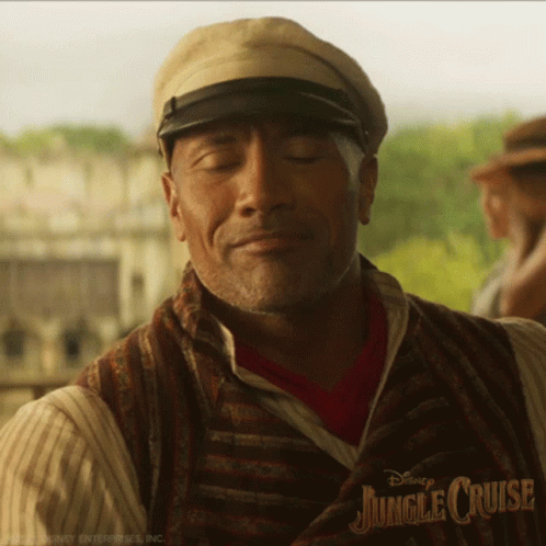 Man With Eyes Closed Wearing Jungle Cruise Hat And Vest GIF