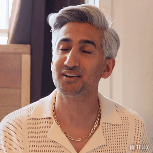 Man with Eyes Closed Wearing Netflix Logo