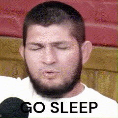 Man With Eyes Closed Wearing White Shirt Saying Go Sleep GIF