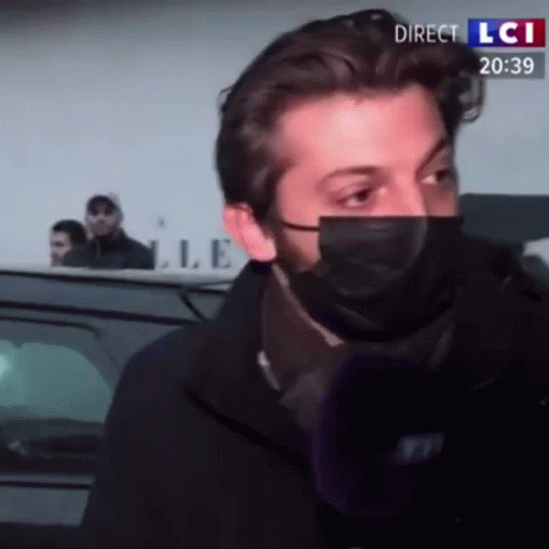 Man With Face Mask Interviewed on LCI