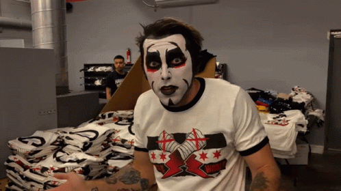 Man with Face Paint and Wrestling Shirt
