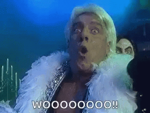 Man with Feather Boa Saying Wooooooo