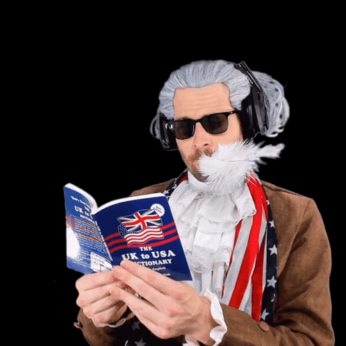 Man with Feather Reading UK to USA Dictionary