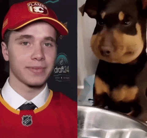 Man With Flames Hat and Small Dog
