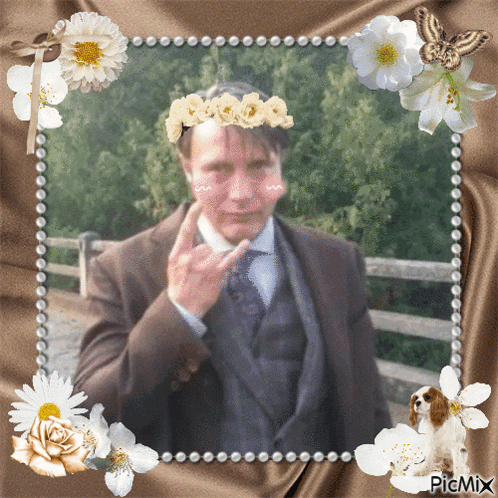 Man With Flower Crown Amid Flowers And Butterfly GIF
