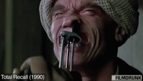 Man With Fork In Mouth Total Recall 1990 GIF