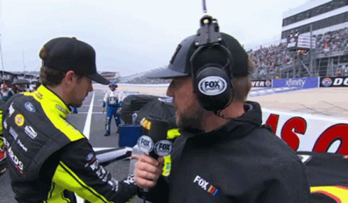 Man With Fox Radio Headset Talking To Another GIF