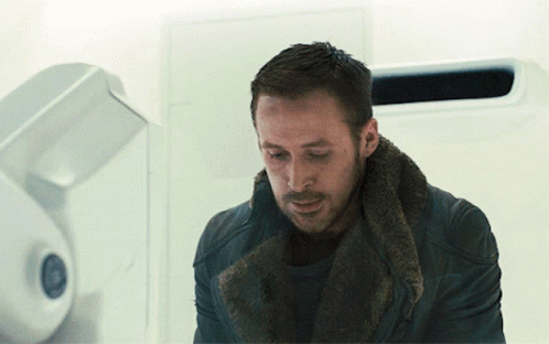 Man With Fur Collar Looking Down
