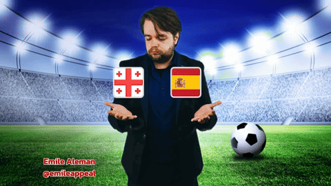 Man With Georgian and Spanish Flags and Soccer Ball