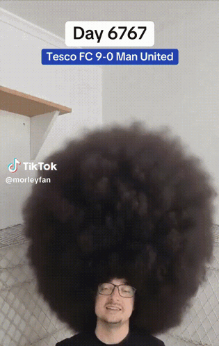 Man with Glasses and Afro with Tesco FC 9-0 Man United Sticker