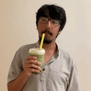 Man With Glasses And Beard Drinking Bubble Tea GIF