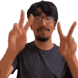 Man With Glasses and Beard Giving Peace Sign