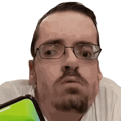 Man with Glasses and Beard Holding Cell Phone