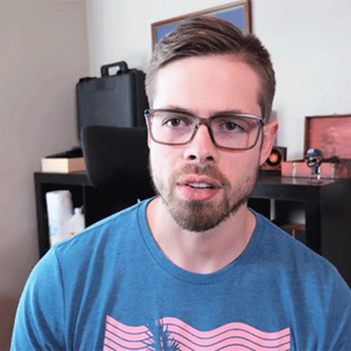 Man With Glasses And Beard In Blue Shirt GIF