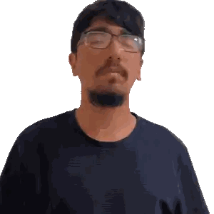 Man With Glasses And Beard In Blue Shirt