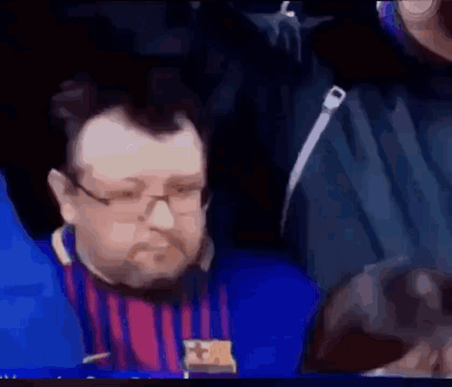 Man with Glasses and Beard in FC Barcelona Shirt