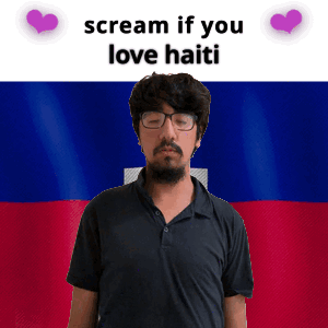 Man With Glasses And Beard In Front Of Haiti Flag GIF