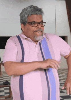 Man With Glasses And Beard In Pink Striped Shirt GIF