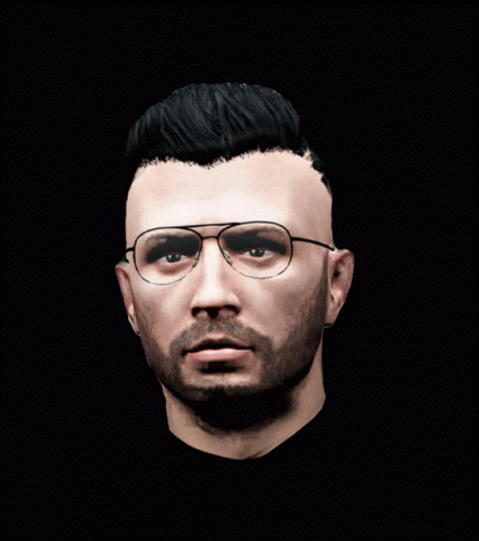 Man With Glasses and Beard Looking at Camera on Black Background