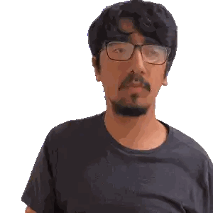 Man with Glasses and Beard Looking Sideways