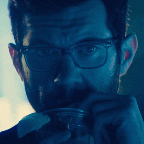Man with Glasses and Beard Making Face