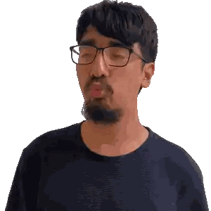 Man with Glasses and Beard Making Face