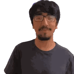 Man with Glasses and Beard Making Face