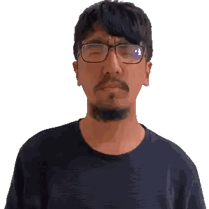 Man with Glasses and Beard Making Funny Face