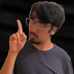 Man With Glasses and Beard Pointing