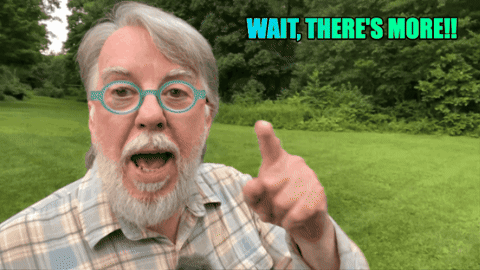 Man With Glasses and Beard Pointing Saying Wait There's More