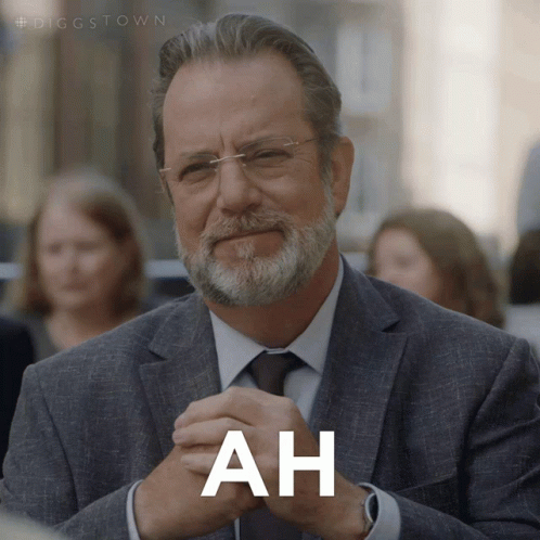 Man with Glasses and Beard Saying Ah