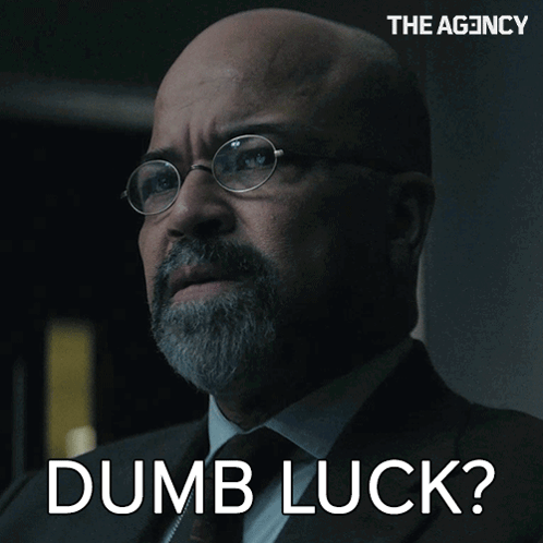 Man With Glasses and Beard Saying Dumb Luck