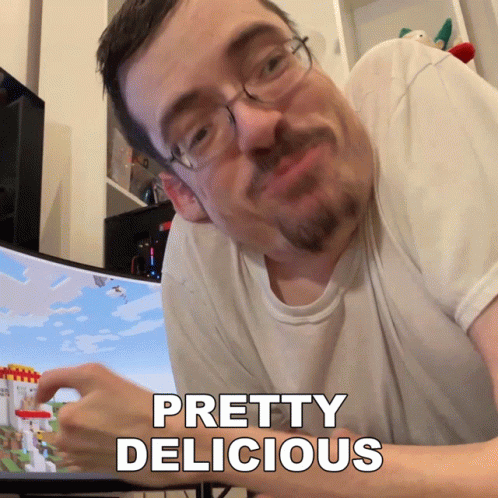 Man With Glasses and Beard Says Pretty Delicious