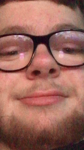 Man With Glasses And Beard Smiling GIF