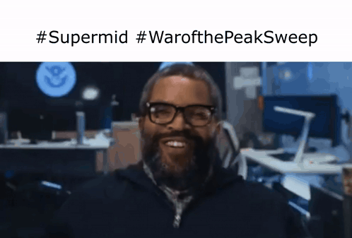 Man With Glasses and Beard Smiling Office Supermid Warofthepeaksweep