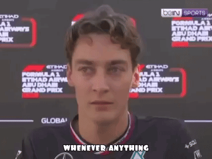 Man With Glasses And Beard Smiling Says Try It GIF