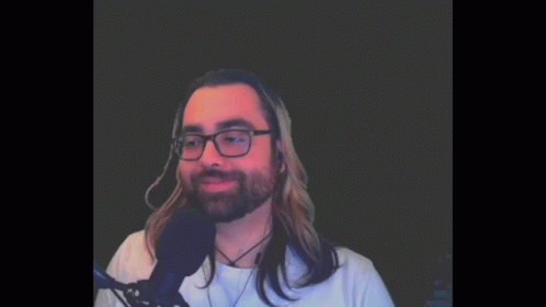 Man with Glasses and Beard Speaking
