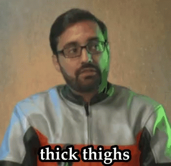 Man With Glasses and Beard Wearing Thick Thighs Shirt