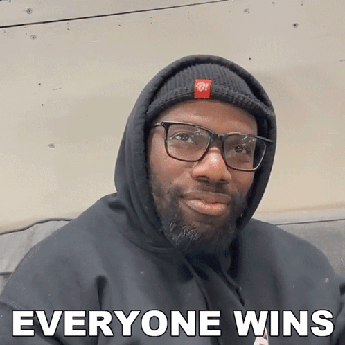 Man With Glasses and Black Hoodie Everyone Wins