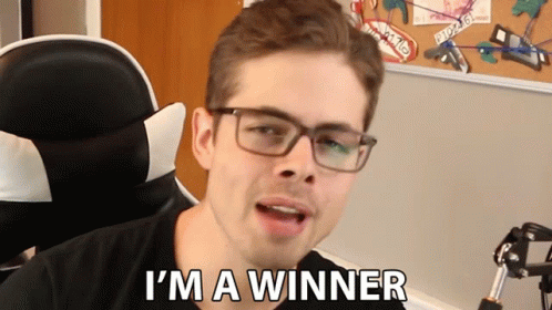Man With Glasses and Black Shirt I'm a Winner