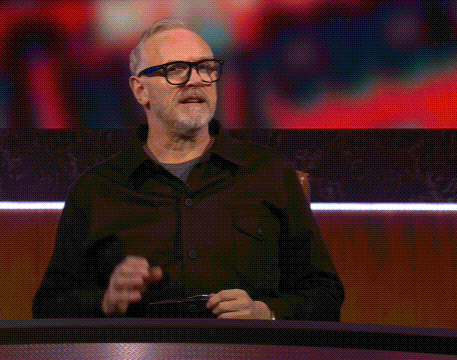 Man With Glasses And Black Shirt Saying Interesting GIF