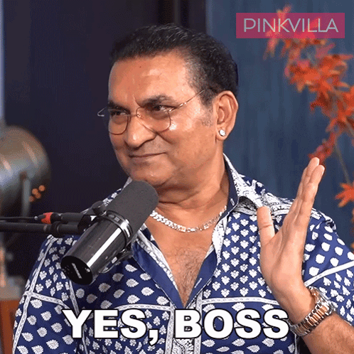 Man with Glasses and Blue Shirt Saying Yes Boss