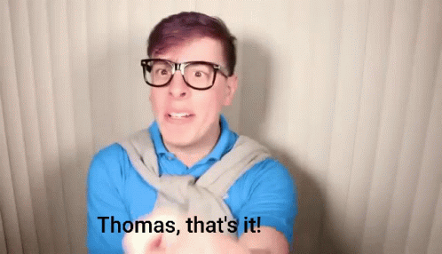 Man With Glasses and Blue Shirt Says Thomas That's It